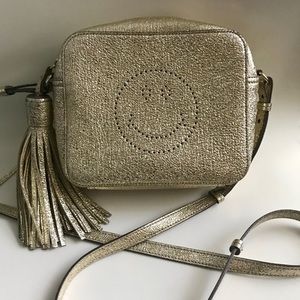 Anya Hindmarch “Smiley Cross-Body” bag